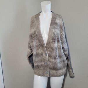 le Lion Medium sweater virgin wool v-neck cable knit soft colorblock 3 button